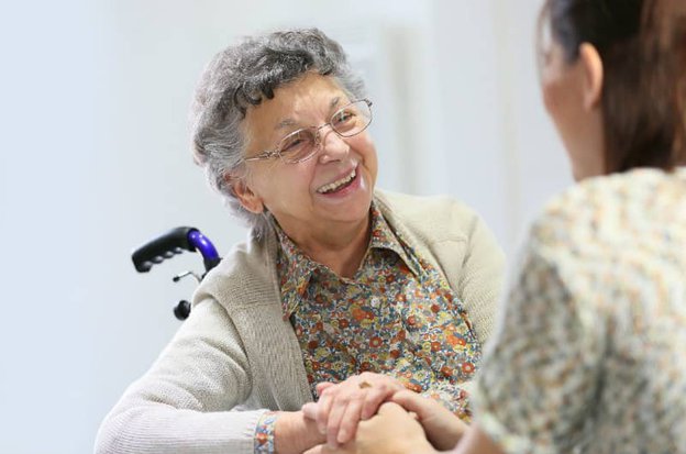 Carer Talking to Elderly