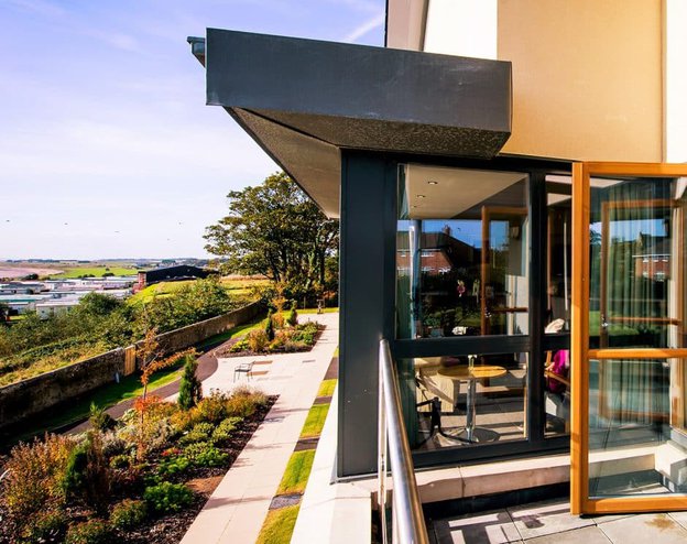 Balcony and exterior of Monkbarns Care home in Arbroath