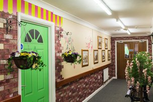 Netherton Green Care Home, hallway with green door 