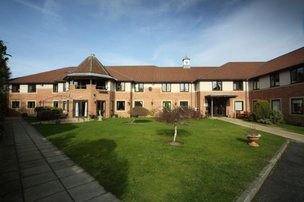Ponteland Manor Nursing Home in Newcastle Upon Tyne exterior of home with garden