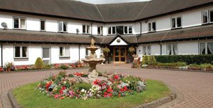 Assisted Living at Prestbury Beaumont in Prestbury exterior of home