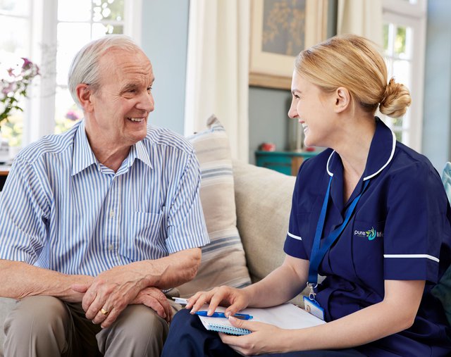 Pure Life Homecare, carer with client