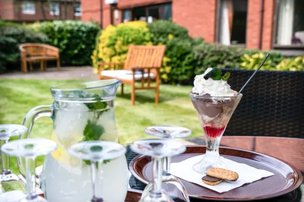 Rievaulx House Care Home in Armley, patio and garden