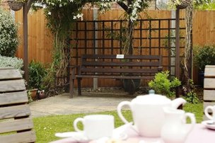River Court Care Home in Watford, garden and patio