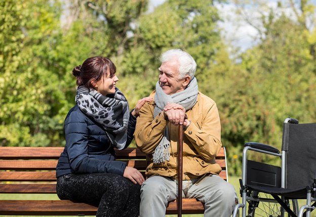 Royal Care Maidstone carer sitting with client