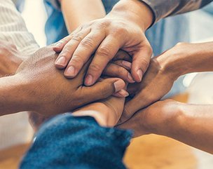 Kome Care Community, holding hands 