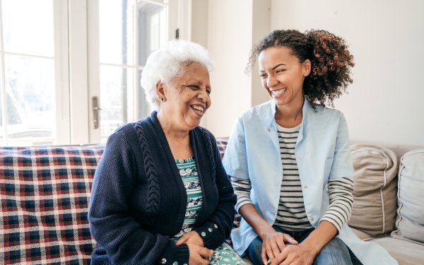 Siete Care, Banbury, carer sitting down with elderly lady 