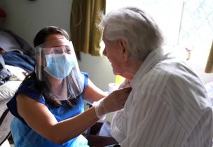 Siete Care, Banbury, Carer helping eldery man 