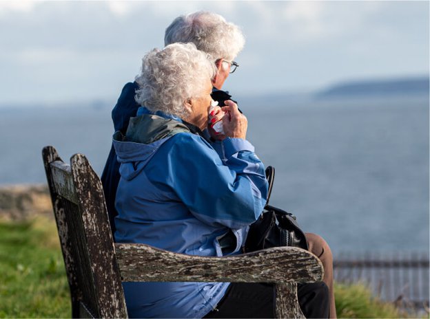 Meloosha Homecare Falkirk, sitting on the bench. 
