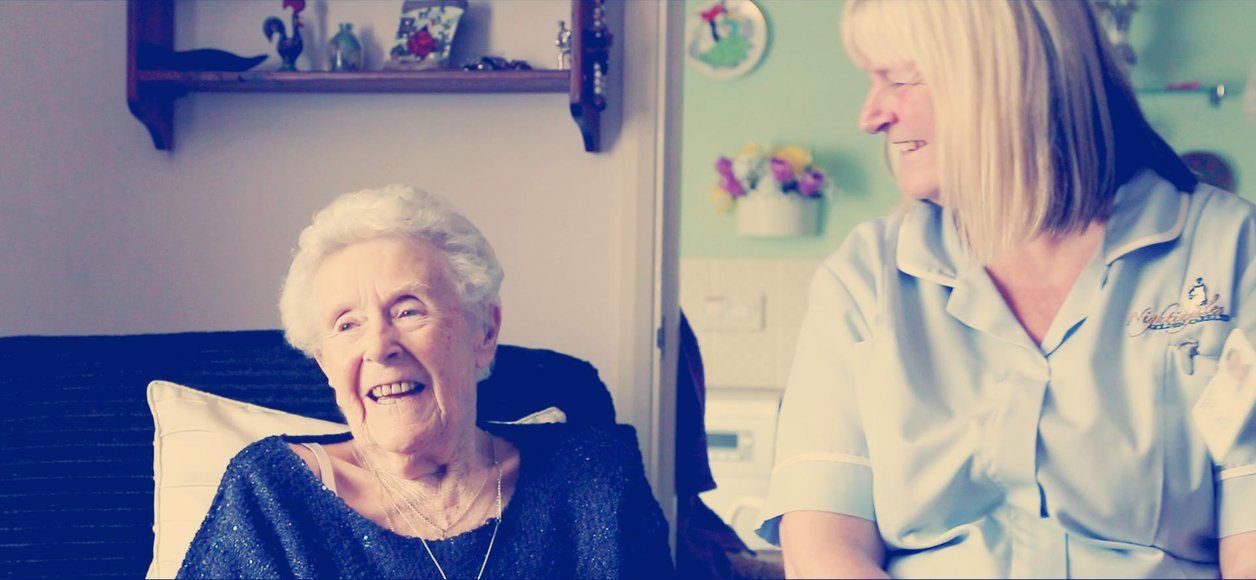 Nightingales Golden Care Live in, carer with service user