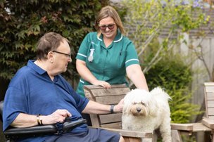 SureCare Central Cheshire, elderly man with dog 