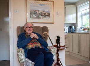 Sylvian Care South East London Live-in Care Gentleman Client Sitting on Armchair