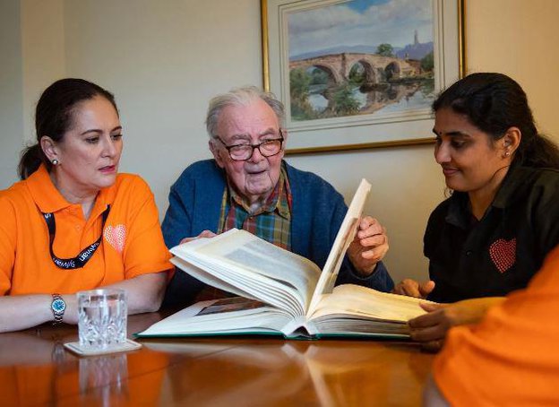 Sylvian Care South East London Carers with Client Reminiscing