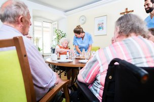 The Priory Care Home, group of residents sitting together 