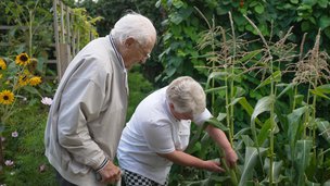Trenewydd Care Home - 2 residents enjoying the garden