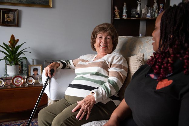 Sylviancare North Wigan carer with elderly women sitting down 